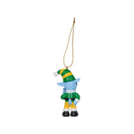 A small goat hanging ornament with a blue body, green and yellow striped hat, green outfit, yellow pants, and black shoes, suspended by a gold string on a white background.