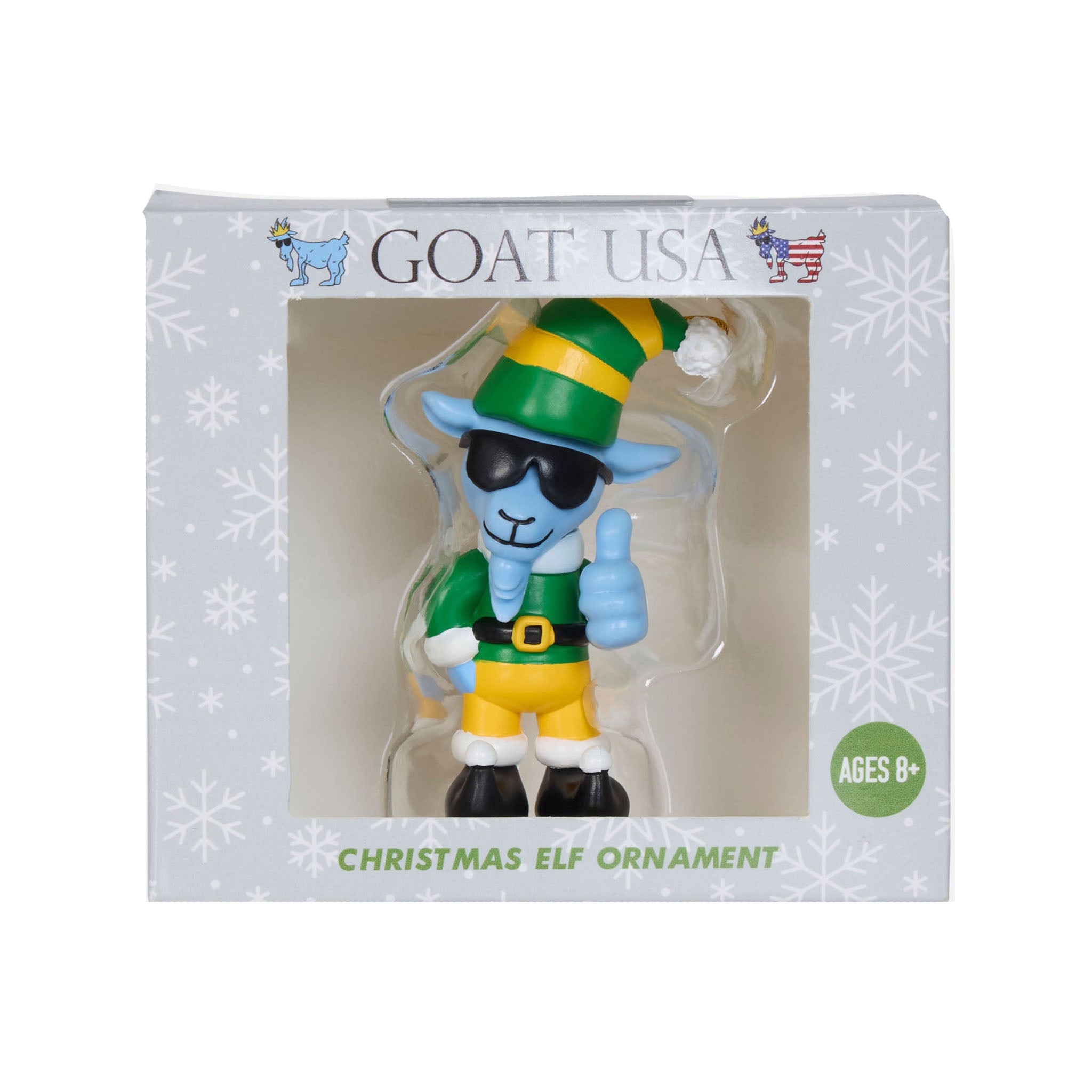Goat USA Christmas Elf Ornament in its original retail packaging, featuring a blue goat character dressed as a Christmas elf with a green and yellow striped hat, sunglasses, and a thumbs-up gesture.