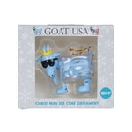 A Christmas ice cube ornament featuring a blue goat character wearing sunglasses and a gold crown, displayed inside its clear window packaging with 'GOAT USA' branding.