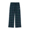 A pair of wide-leg plaid lounge pants in dark green with white and light blue lines, featuring an elastic waistband and a small white embroidered logo on the left thigh.