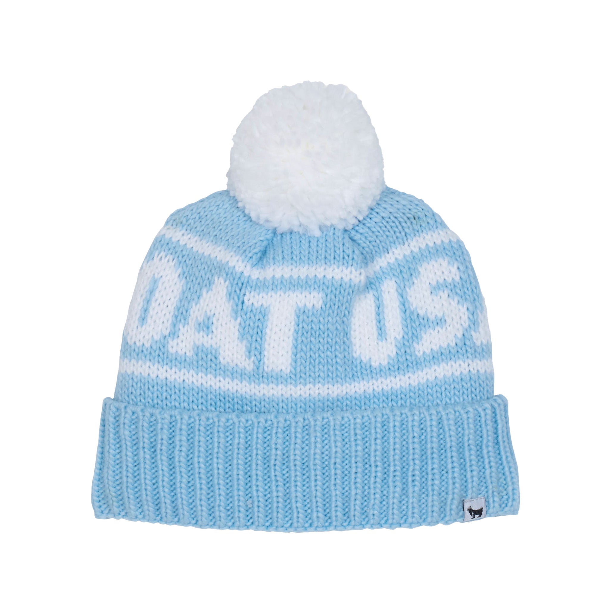 A light blue and white knit beanie hat with a white pom-pom on top. The word 'GOAT USA' is knitted across the front, and a small black fox logo is visible on the lower right cuff.