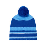 Back of a blue and light blue striped knit beanie hat with a fluffy blue pom-pom on top, shown against a plain white background.
