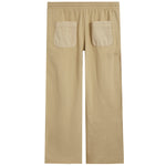 A pair of beige pants shown from the back, featuring an elastic waistband and two matching beige welt pockets on the back of the legs, set against a plain white background.