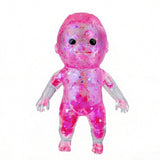 Pink baby gummy squishy with a glittery texture on a white background