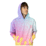 A man wearing a pastel gradient hoodie with a sprinkle pattern and ice cream cone graphics at the bottom, set against a plain white background.