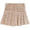 A high-waisted tweed mini skirt with a pleated flared silhouette, featuring a button-front closure and a multicolor woven pattern of beige, brown, and gold.