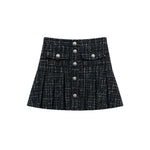 A black and gray tweed pleated mini skirt with a button-up front and decorative silver-tone buttons, shown flat on a white background.