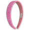 A pink glitter headband with a soft pink inner lining 