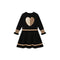 A black long-sleeve children's dress with a leopard-print heart patch on the chest, beige stripes on the sleeves and hem, and ruffled cuffs, shown on a plain white background.