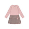 A girls' long-sleeve dress with a solid light pink upper body and sleeves, and a textured tweed skirt in pink, beige, and brown tones with a scalloped hem and a small pink tassel detail.