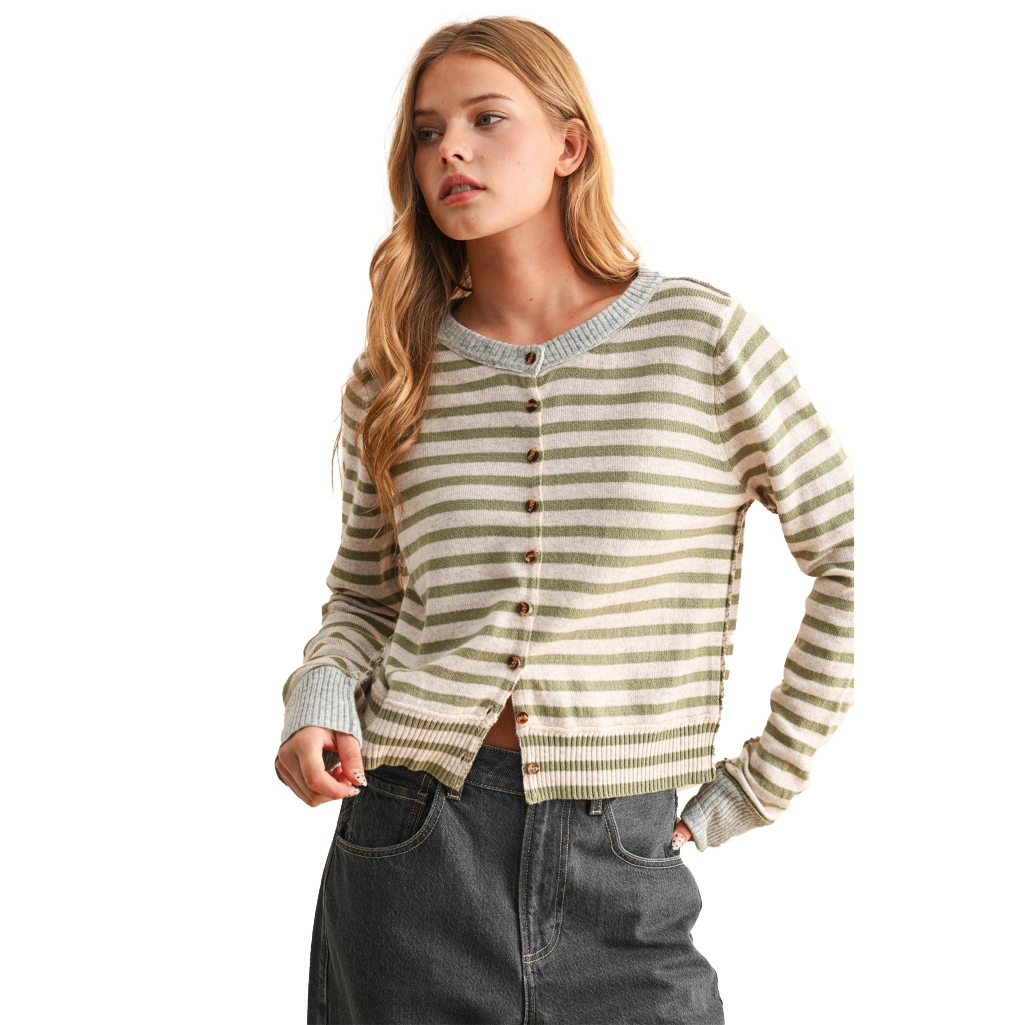 A woman modeling a cropped, long-sleeve knit cardigan with horizontal olive green and cream stripes, featuring brown buttons down the front against a solid white background.