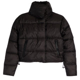 A black cropped puffer jacket with a high stand-up collar, horizontal quilting, and zippered pockets, shown against a plain white background.