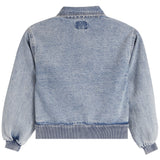 A light blue washed denim jacket shown from the back, featuring a ribbed collar, cuffs, and hem, set against a plain white background.