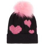 A black knit beanie hat featuring a fluffy light pink pom-pom on top and three glittery pink heart motifs on the front, set against a plain white background.