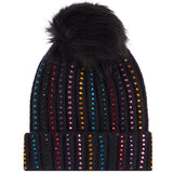 A black ribbed knit pom-pom beanie decorated with vertical columns of colorful rhinestones, shown against a plain white background.