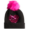 A black knit beanie hat featuring a large, fluffy hot pink pom-pom on top and a sequined hot pink heart on the front, set against a plain white background.