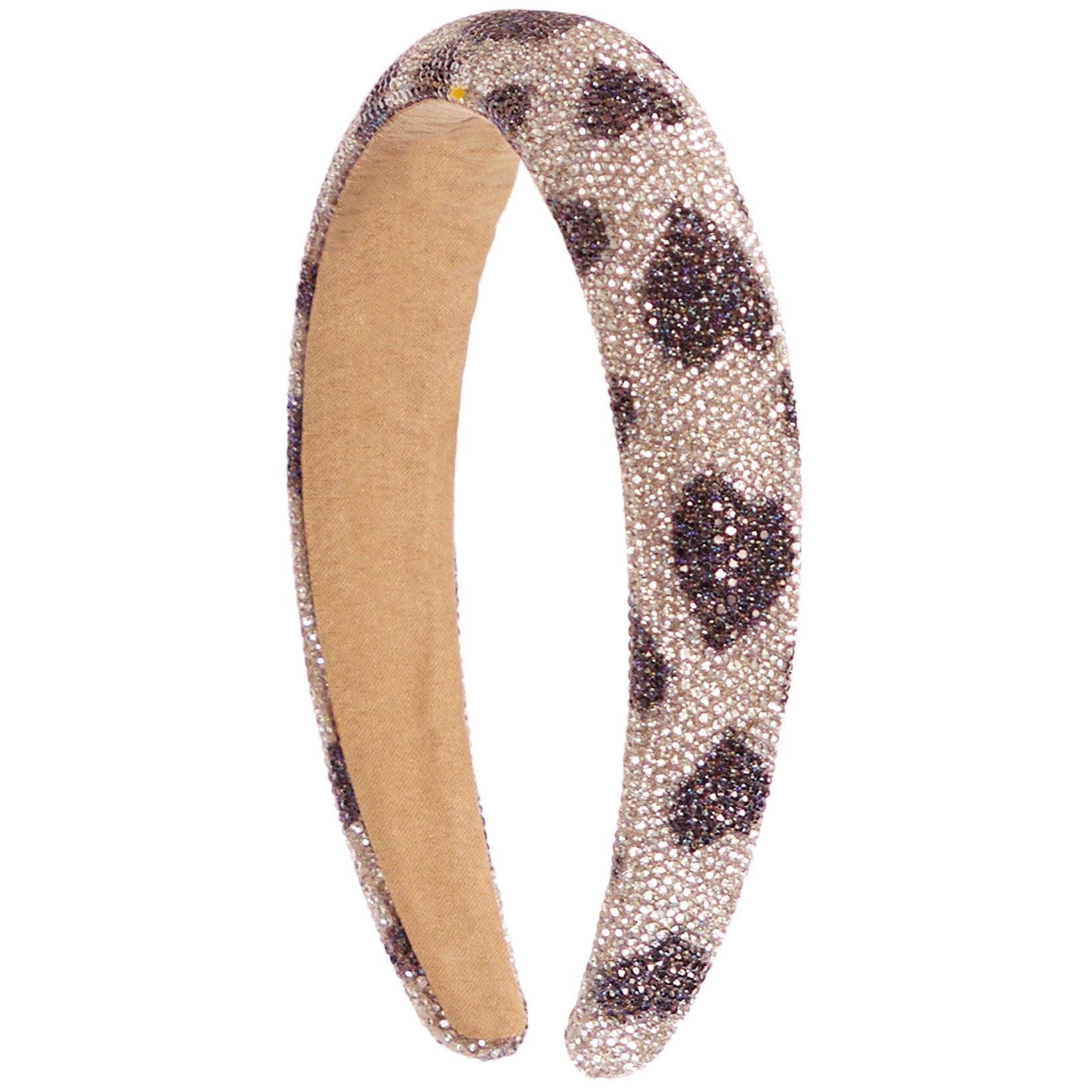 A padded headband featuring a heart print pattern of dark brown spots on a beige background, embellished with sparkling rhinestones, and finished with a tan fabric lining.
