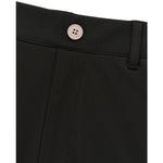 Close-up of black shorts showing the waistband with a single light-colored button and belt loop.