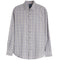 A long-sleeve button-up plaid shirt in beige, gray, and navy blue, shown flat against a white background.