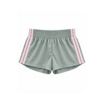 Light sage green athletic shorts with pink double stripes down the sides, featuring an elastic waistband, shown against a plain white background.