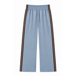 Light blue wide-leg cropped pants with double brown side stripes and an elastic waistband, shown flat on a white background.