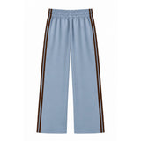 Light blue wide-leg cropped pants with double brown side stripes and an elastic waistband, shown flat on a white background.