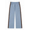 Light blue wide-leg cropped pants with double brown side stripes and an elastic waistband, shown flat on a white background.