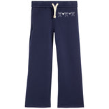 Navy blue sweatpants with a white drawstring and a small white bows with hearts on the left hip, shown against a plain white background.