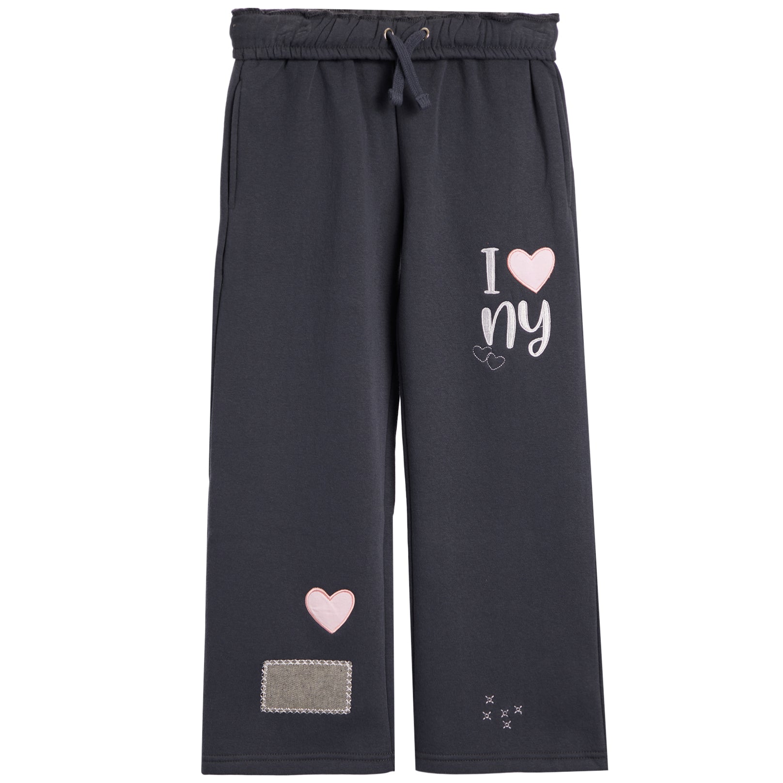 Dark gray wide-leg sweatpants with an elastic drawstring waist, featuring a 'I [heart] ny' graphic on the right leg, a pink heart patch on the left leg, and small white 'x x x' details near the hem.