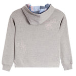 A light gray heathered hooded sweatshirt shown from the back, featuring subtle light pink embroidered bow and star motifs. The interior hood lining has a blue and white gingham pattern with pink accents.