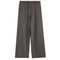 A pair of wide-leg sweatpants in a washed charcoal gray color, featuring an elastic waistband with a drawstring and side pockets, shown against a plain white background.
