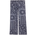A pair of wide-leg pants in a dark gray fabric with a white paisley and floral bandana print, shown flat against a white background.