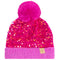 A bright pink beanie hat covered in sequins, featuring a fluffy pink pom-pom on top and a ribbed knit cuff with a small tan 'cc' logo patch.
