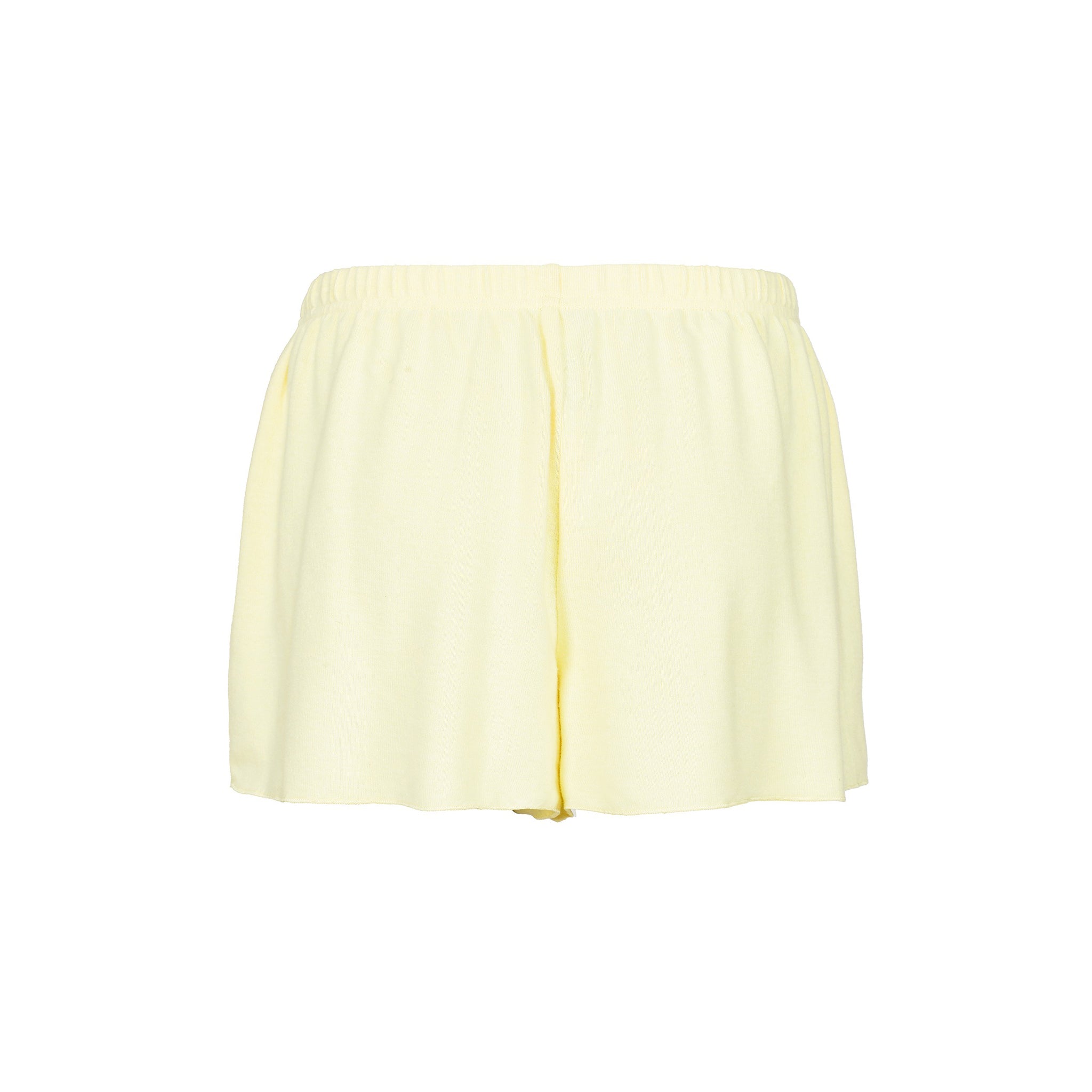 Light yellow shorts on a white background