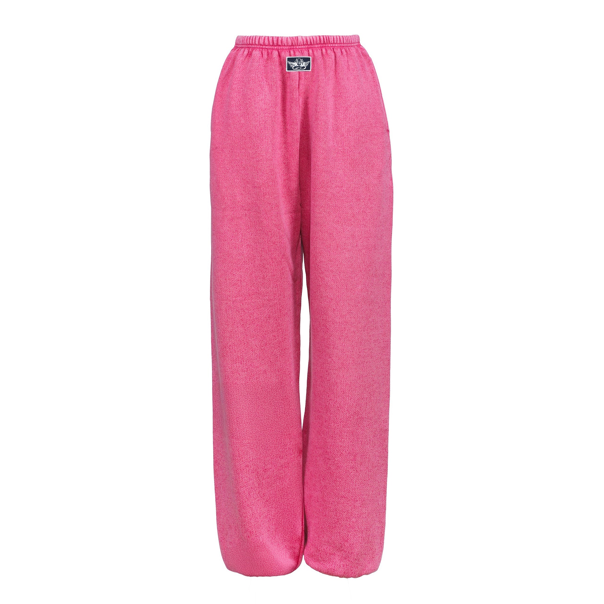 Bright pink wide-leg sweatpants with an elastic waistband and a small black brand patch on the front, shown against a plain white background.