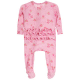 Pink baby footed one-piece jumpsuit with a floral rose print and a ruffled trim across the waist, shown on a plain white background.