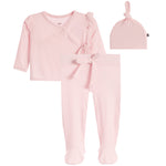 A three-piece baby outfit set in light pink ribbed fabric, including a long-sleeve wrap-style top with ruffle details, matching footed pants with a front bow, and a knotted beanie hat, displayed on a solid white background.