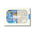 The Hanukkah 'Charm Spring' create kit in its white packaging, featuring a clear window that displays blue beads, glitter, and patterned paper inside.