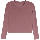A dusty rose ribbed long-sleeve crop top with shoulder cutouts, shown flat against a white background. The brand name 'KATIE J.