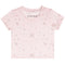 A light pink short-sleeve baby t-shirt with a delicate all-over floral print in shades of pink, green, and blue. The brand name 'KATIEJ' is printed inside the collar.