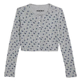 A light gray long-sleeve cropped cardigan with a small dark blue floral pattern, featuring a button-up front.