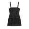 A sleeveless black tweed mini dress with thin shoulder straps, a square neckline, and two front flap pockets, shown on a plain white background.