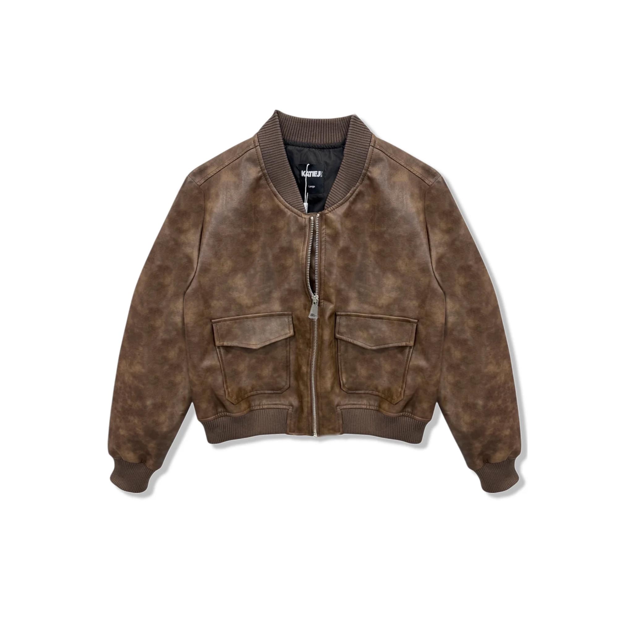 A brown faux-leather bomber jacket with a mottled distressed finish, featuring a ribbed collar, cuffs, and hem, and two front flap pockets, shown against a plain white background.