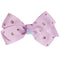 A light purple ribbon hair bow decorated with small pink rhinestones and a central iridescent bead accent, shown on a plain white background.