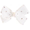 A white ribbon hair bow embellished with small rhinestones and a central pearl cluster, shown against a plain white background.