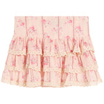 A light pink tiered ruffle skirt with a delicate floral print and lace trim, shown flat against a white background.