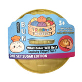 Squishy rainbow mystery squishy bun toy with colorful bun design and text on a white background