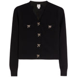 A black knit cardigan sweater with a V-neck, long sleeves, and four decorative bow-shaped buttons on the front. Two of the bow buttons are on the chest, and two are positioned vertically down the center front.