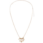 A delicate gold chain necklace featuring a central cluster of small gold beads and dangling star charms, displayed against a solid white background.