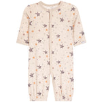 A baby's short-sleeve footless one-piece jumpsuit in a warm cream color, decorated with an all-over pattern of stars in brown, orange, and light blue, and small dots. It features a snap-button front closure and elastic cuffs.